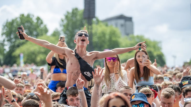 Festivalgoers watch Jamie Webster on the main stage at the Trnsmt Festival last year (PA)