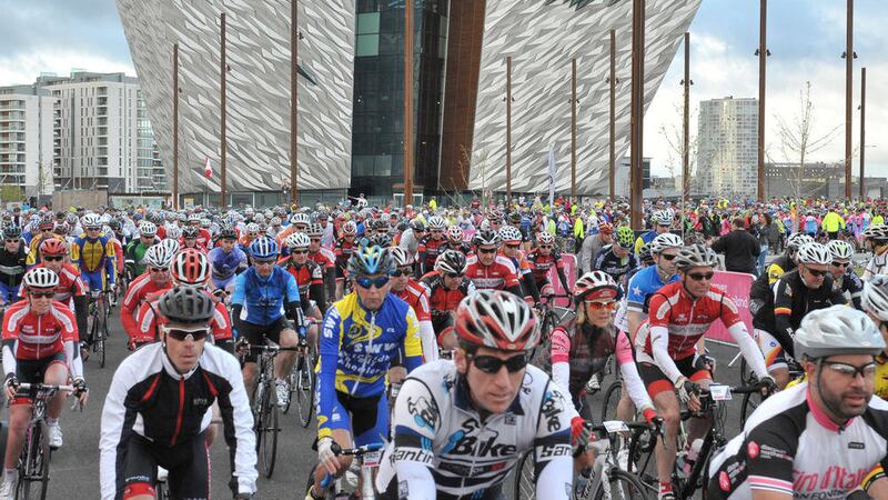 Mass start of the Gran Fondo at Titanic Quarter with cyclists led off by Stephen Roche and Team Sky&#39;s Richie Porte 