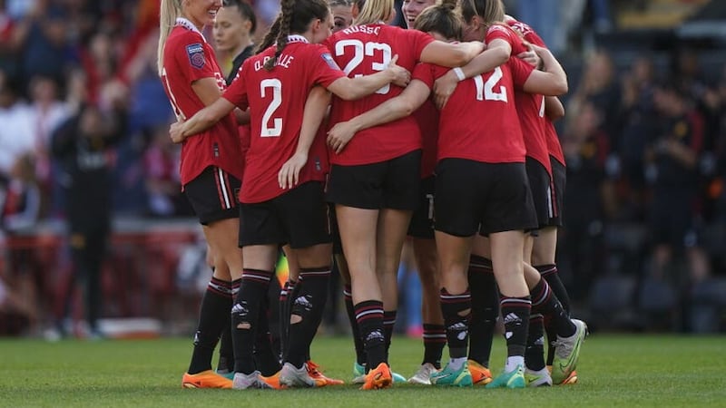 Manchester United players celebrate Hayley Ladd’s opener (Tim Goode/PA)