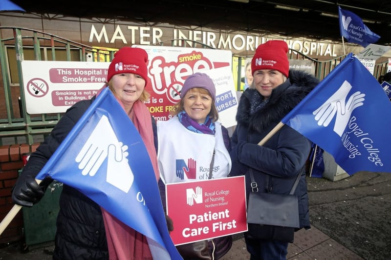 Specialist nurses Gael Gartside, Lynn O'Hara, and Brenda Crummey picket outside the Mater Hospital in Belfast during the second day of strike action by the Royal College of Nursing. Picture by Mal McCann