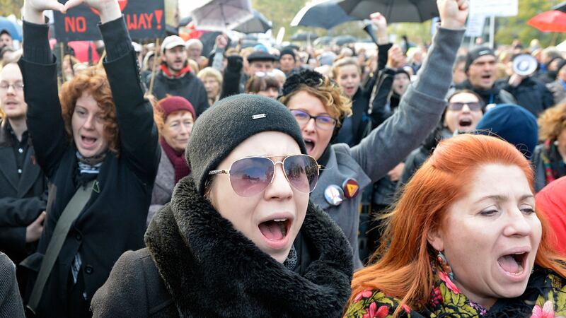 Protesters shout slogans during a rally in front of the parliament in Warsaw, Poland. Picture by Alik Keplicz, Associated Press&nbsp;