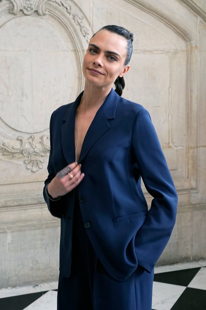 Model Cara Delevingne poses for photographers prior to the Dior's Haute Couture Fall-Winter 2021-2022 fashion collection presented Monday, July 5, 2021, in Paris