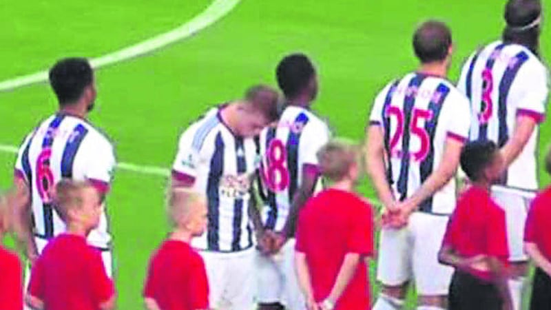 James McClean pictured appearing to turn his back to the British national anthem during a West Brom friendly in South Carolina 