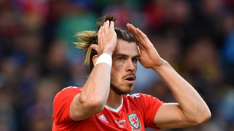 &nbsp;Key man Gareth Bale was kept on the bench until the 64th minute, by which point Wales were already 2-0 down<br />Picture by PA