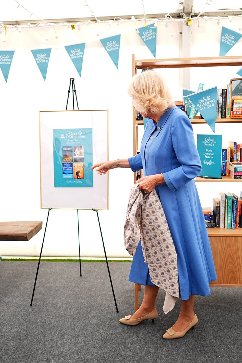 The Queen as she unveils the titles for the four new books in The Queen’s Reading Room Book Club Autumn 2026 season