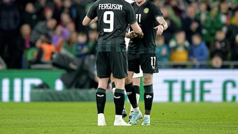 Republic of Ireland&#39;s James McClean (right) is congratulated by team-mate Evan Ferguson as he ends his international career 