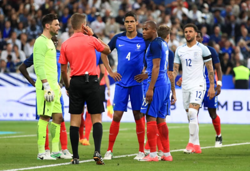 France's Raphael Varane is sent off