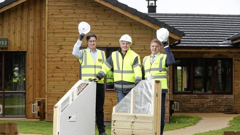 Pictured at the new Center Parcs lodges in Longford are: Cormac Fitzpatrick, Sisk senior contracts manager; Paul Kent, Center Parcs construction and development director; and Sean Fox, FastHouse sales and installations director 