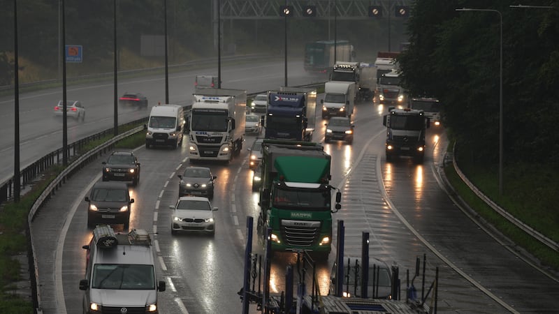 Slow traffic in heavy rain on the M62 near Brighouse in West Yorkshire, as the Met Office has issued a yellow weather warning across the Midlands for thunderstorms and the south of England for strong winds. Picture date: Wednesday August 2, 2023.