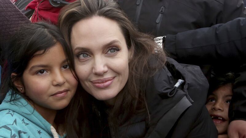 The Hollywood star was surrounded by children as she made her fifth visit to Jordan.