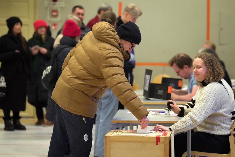 A man casts his ballot during the presidential election in Helsinki (Sergei Grits/AP)