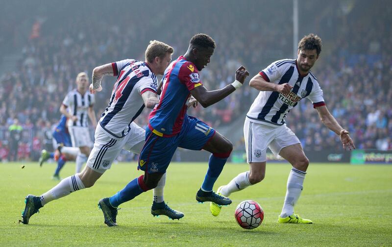Crystal&nbsp;Palace's Wilfried Zaha and West Bromwich Albion's James McClean battle for the ball&nbsp;