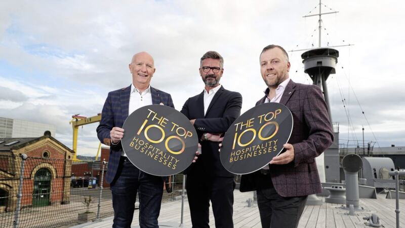 Launching the Top 100 are Hospitality Ulster chief executive Colin Neill (left) and its chairman Mark Stewart (right) with food critic and judging panel chair Joris Minne 