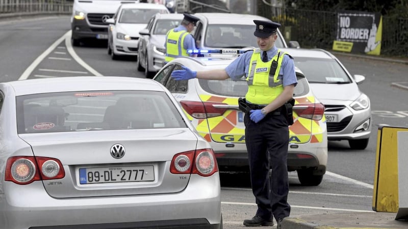 Garda&iacute; stopping motorists on the border between Lifford and Strabane earlier this month. Police have called for people to stay at home over the bank holiday weekend 