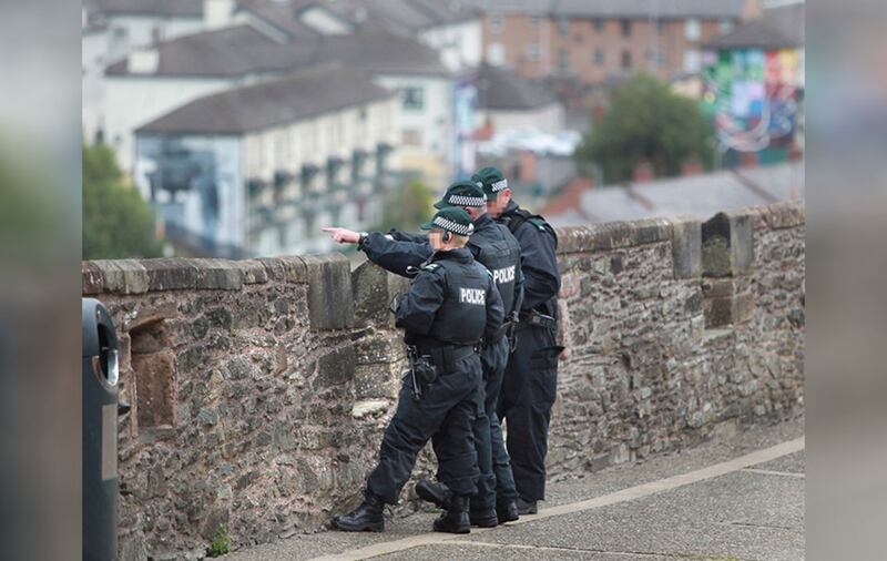 &nbsp;Police on Derry's walls following a fourth night of violence. Picture by Margaret McLaughlin