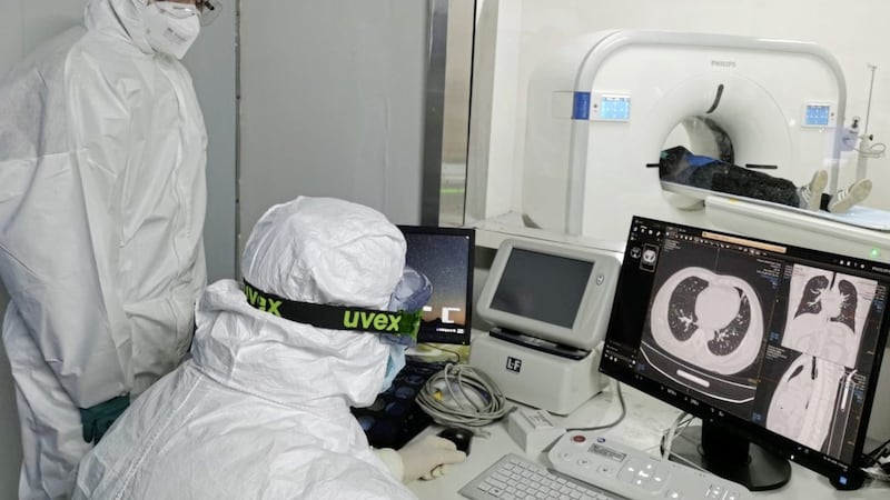 Doctors scan a patient&#39;s lungs at Huoshenshan temporary hospital built for patients diagnosed with coronavirus in Wuhan in central China&#39;s Hubei province 