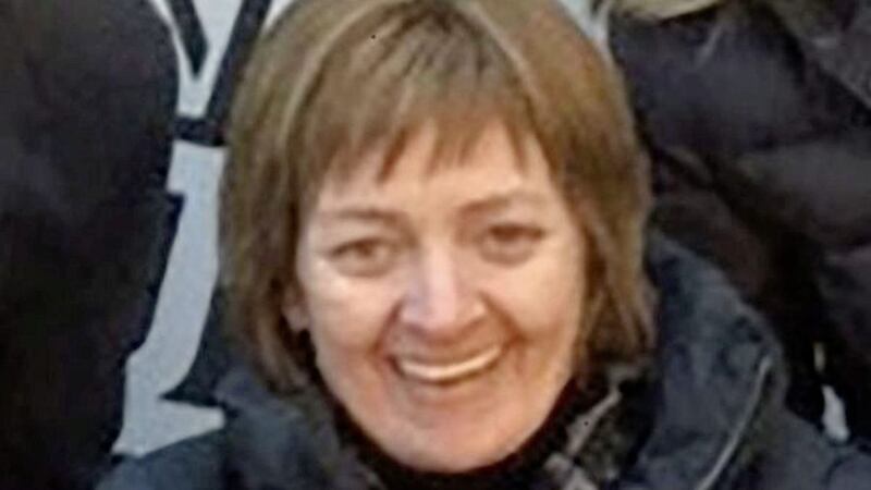 Anne O&#39;Neill was found in the back garden of the house in Ardmore Avenue in Belfast on Saturday morning 