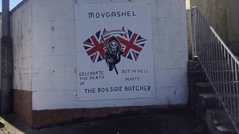 There have been calls to remove a mural mocking the death of former deputy first minister Martin McGuinness 