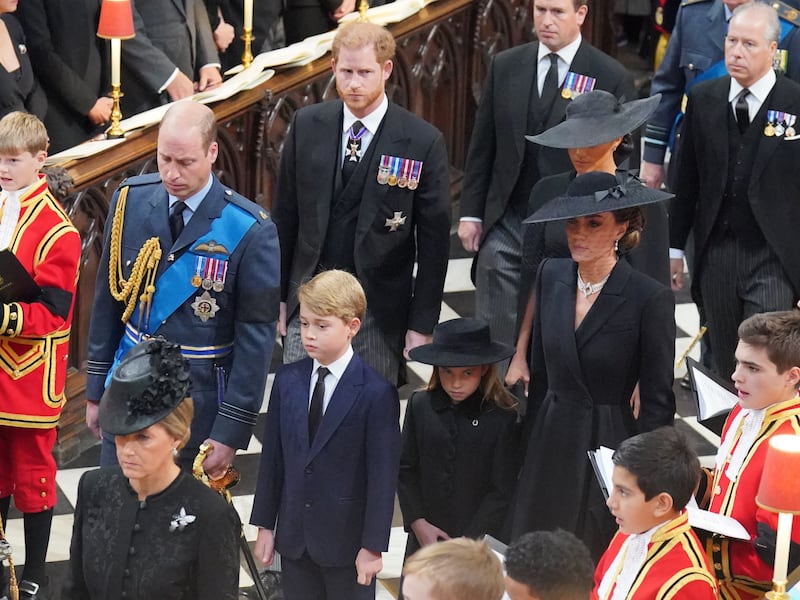 Members of the royal family (left to right, from front) the Prince of Wales, Prince George, Princess Charlotte, the Princess of Wales, the Duke of Sussex, the Duchess of Sussex, Peter Phillips, and the Earl of Snowdon, arriving at the State Funeral of Queen Elizabeth II