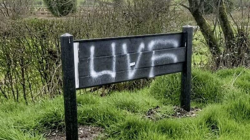 Bilingual Irish and English road signs on Claudy&#39;s Ballyhanedin Road have been daubed with &#39;UVF&#39; graffiti. Picture: Cara Hunter 