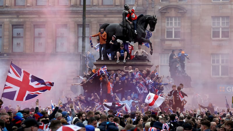 Rangers fans celebrate winning the Scottish Premiership in George Square, Glasgow on Saturday. Picture by Andrew Milligan/PA Wire&nbsp;
