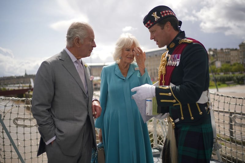 Charles and Camilla at a reception on the flight deck of HMS Iron Duke in Bordeaux