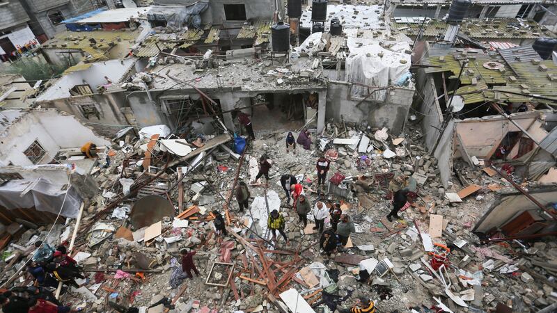 Palestinians look at destruction after Israeli strikes on Rafah, Gaza Strip (Hatem Ali, AP)