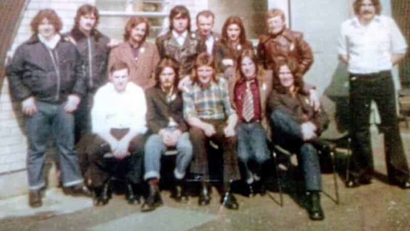 Phil McMahon, seated on left wearing white shirt, and fellow inmates of Long Kesh. Also pictured is Bobby Sands, wearing a checked shirt in the middle of the front row.