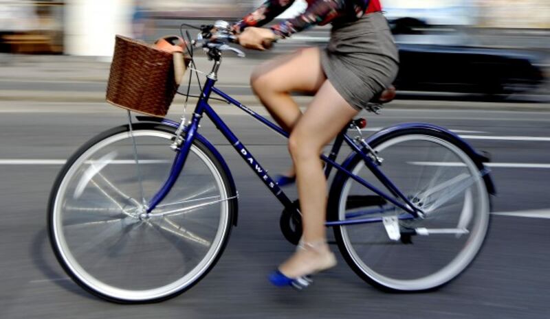 File photo dated 07/08/13 of a woman riding a bike.