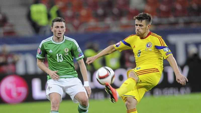 Corry Evans (left) in action for Northern Ireland in Romania in a Euro 2016 qualifier almost six years ago.<br /> Photo Colm Lenaghan/Pacemaker Press