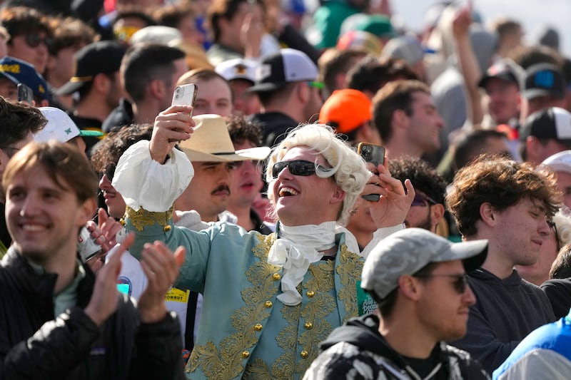 A member of the gallery at the 16th hole takes a selfie during the second round of the WM Phoenix Open (Ross D. Franklin/AP)