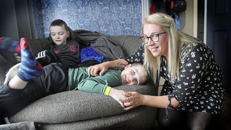 Charlene McAleer at home with her boys Declan (10) and Ronan (eight). Picture by Hugh Russell 