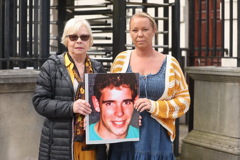 Briege O'Donnell, mother of Dwayne O'Donnell and her daughter Seana hold a photograph of Dwayne. Picture by Mal McCann