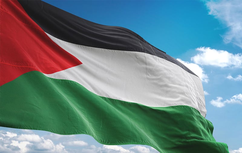 A Palestinian flag. Several men in Derry's Bogside were videoed making anti-semitic comments after a Jewish filmmaker asked why so many Palestinian flags were flying in the area