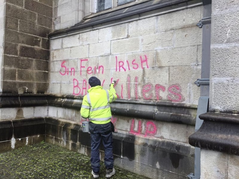 Cleaning up the graffiti at Armagh Cathedral. Pictures courtesy of Armaghi. 