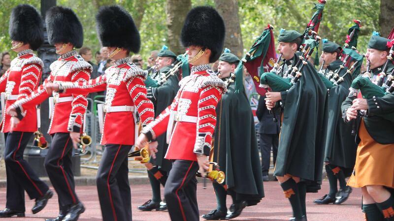 &nbsp;A casting vote at deadlocked meeting secured affiliation for Irish Guards - seen her trooping the colour - to the GAA in London