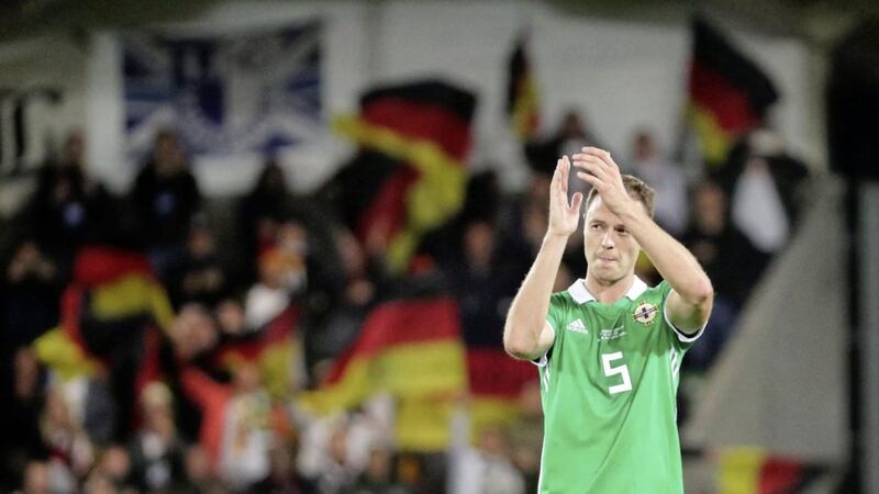 Jonny Evans applauds the Northern Ireland supporters after the Euro 2020 qualifier loss against Germany.<br /> Photo by David Maginnis/Pacemaker Press
