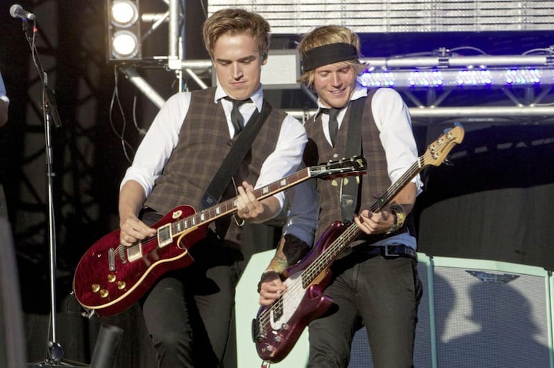 Dougie Poynter on stage with McBusted bandmate Tom Fletcher. The pair are heading up a campaign to encourage people to look after their mental health after Covid. Picture by Alamy/PA 