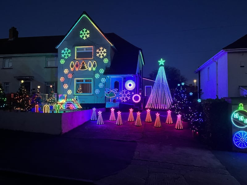 A view of Ian and Ann Cooper's house covered in lights