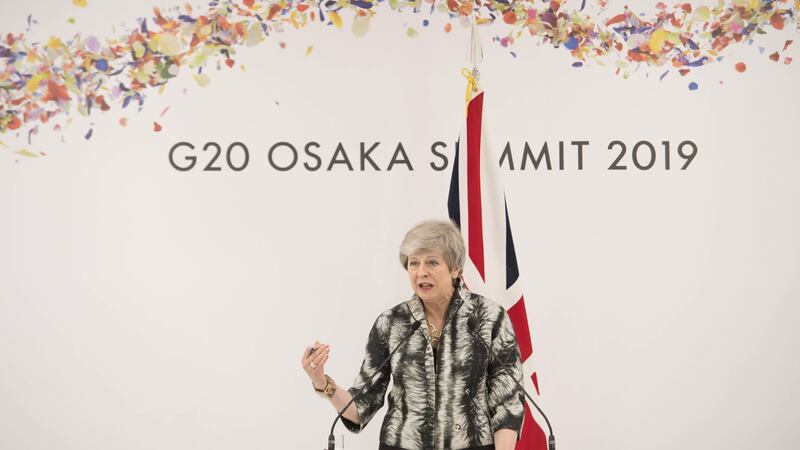 Theresa May was using the gathering in Osaka to urge her counterparts to step up action to tackle climate change.