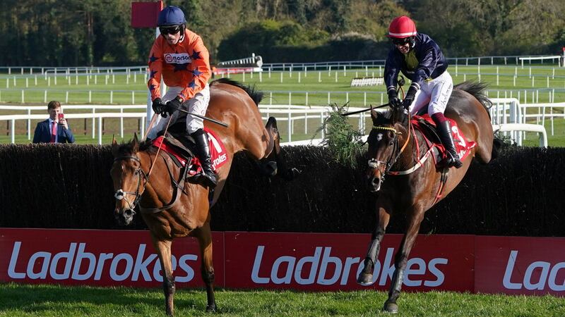 Fastorslow (right) jumps the last alongside Bravemansgame before going on to win the Punchestown Gold Cup