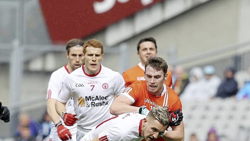 Ciaron O&#39;Hanlon, pictured playing against Tyrone, is back to give Armagh another crack after a three-year absence 