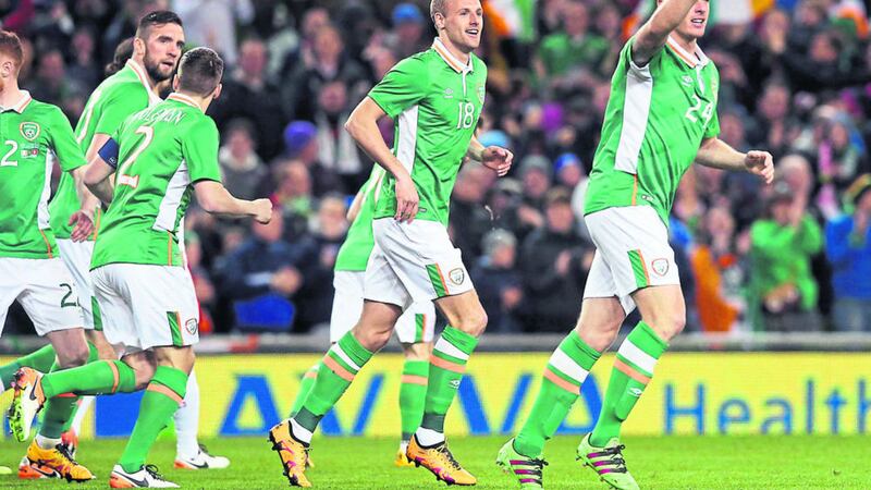 Republic of Ireland&#39;s Ciaran Clark (right) celebrates scoring his side&#39;s first goal in the match against Switzerland in Dublin back in March. For the game players wore a jersey commemorating the 100th anniversary of the Easter Rising. Picture: Brian Lawless/PA Wire 