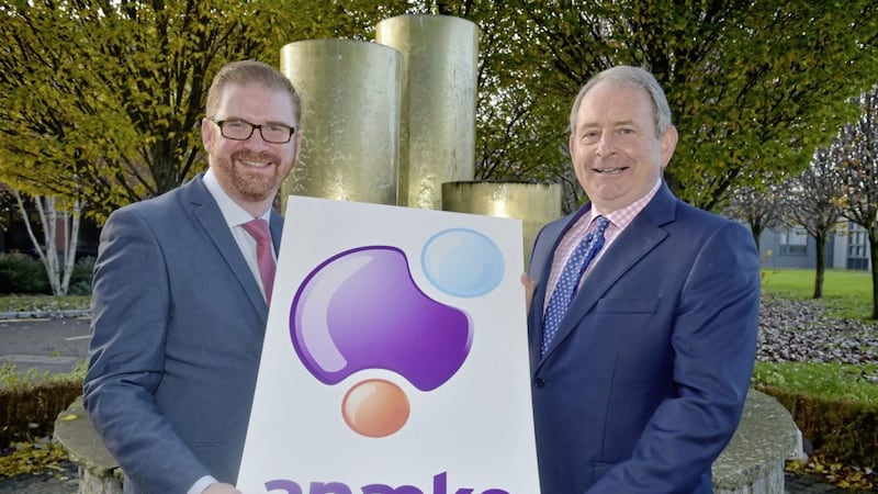 Economy minister Simon Hamilton is pictured at Anaeko company offices in Weavers Court with Denis Murphy, CEO of Anaeko 