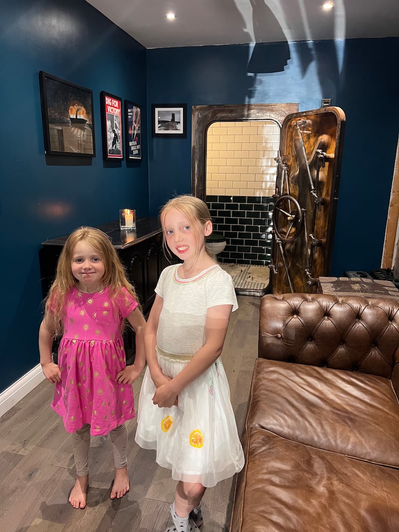 Isabella and Sofia inside the man cave bunker