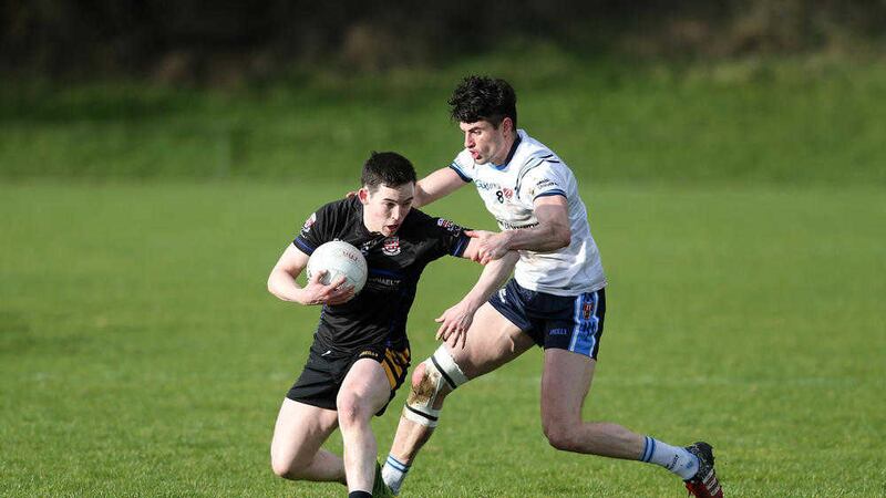 Niall McKeever, right, has impressed at midfield for Ulster University this season