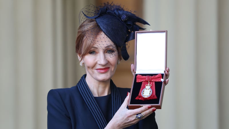 The author of the famous Harry Potter books was given her honour at Buckingham Palace by Prince William.