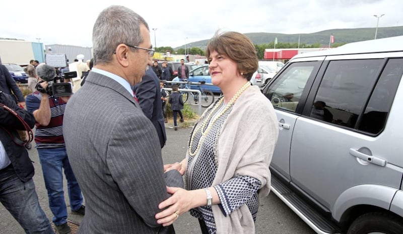 DUP leader Arlene Foster in greeted by Dr Raied Alwazzan at an event by the Belfast Islamic Centre marking the end of the Muslim holy month of Ramadan. Picture by Mal McCann 
