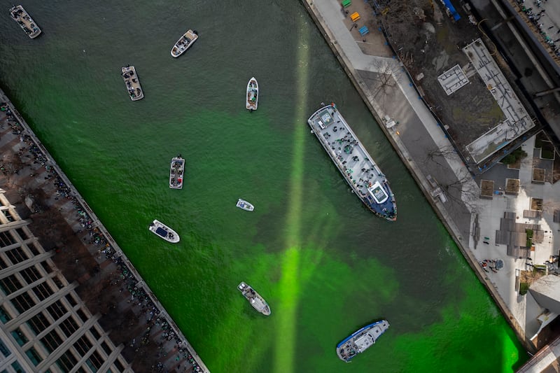 The Chicago River is dyed green ahead of St Patrick’s Day celebrations (AP)
