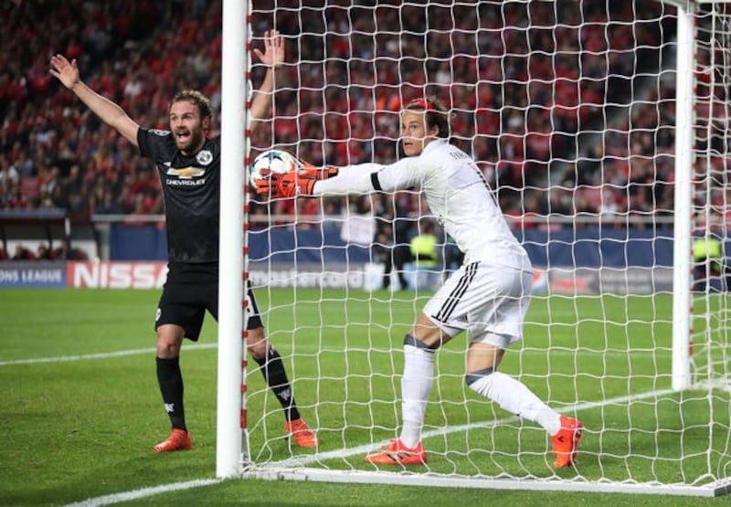 Benfica goalkeeper Mile Svilar concedes a goal against Manchester United in the Champions League
